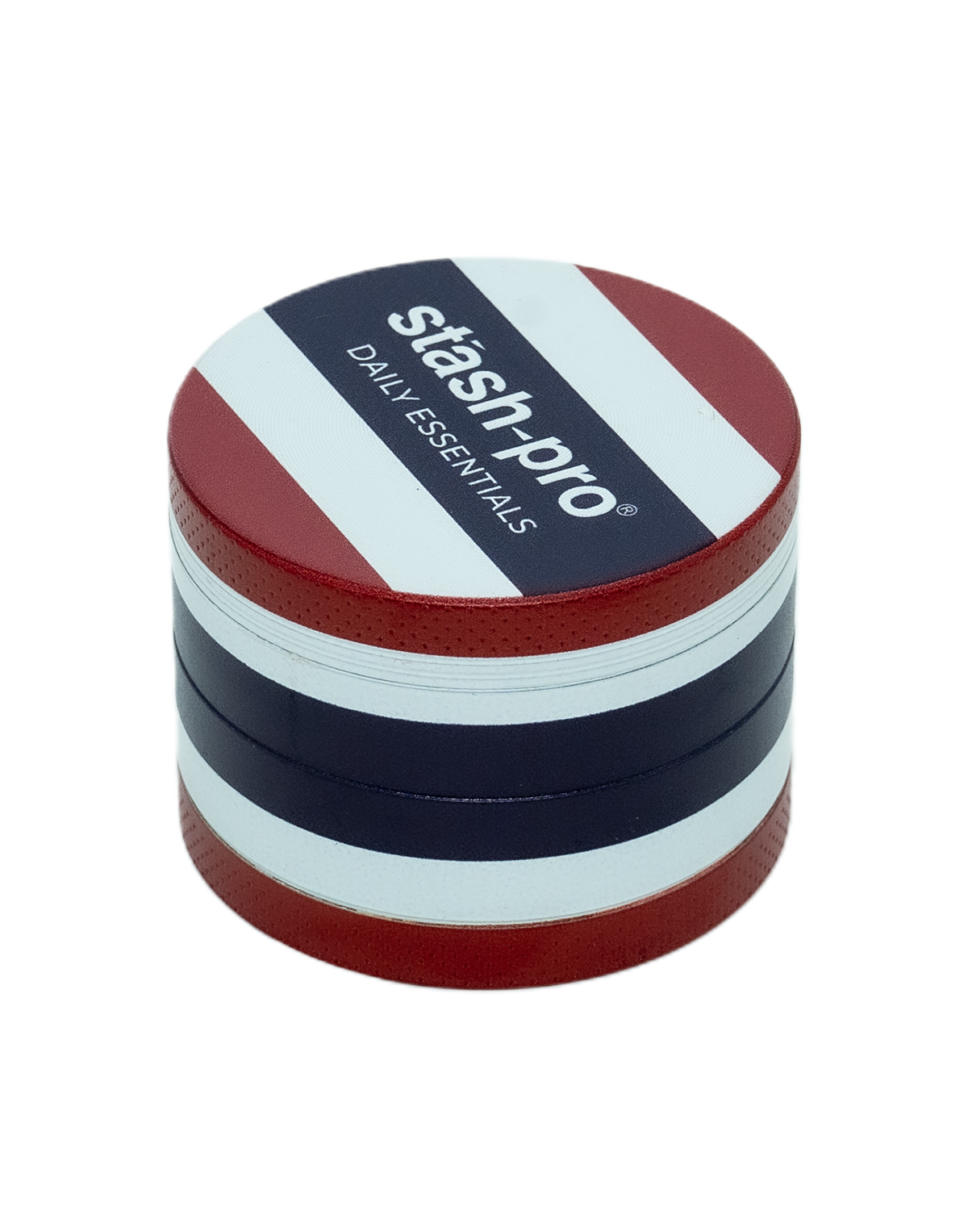 A Stash Pro Large Grinder from the Flag Series, featuring a zinc metal finish with blue and red colors and the brand name on the top.

